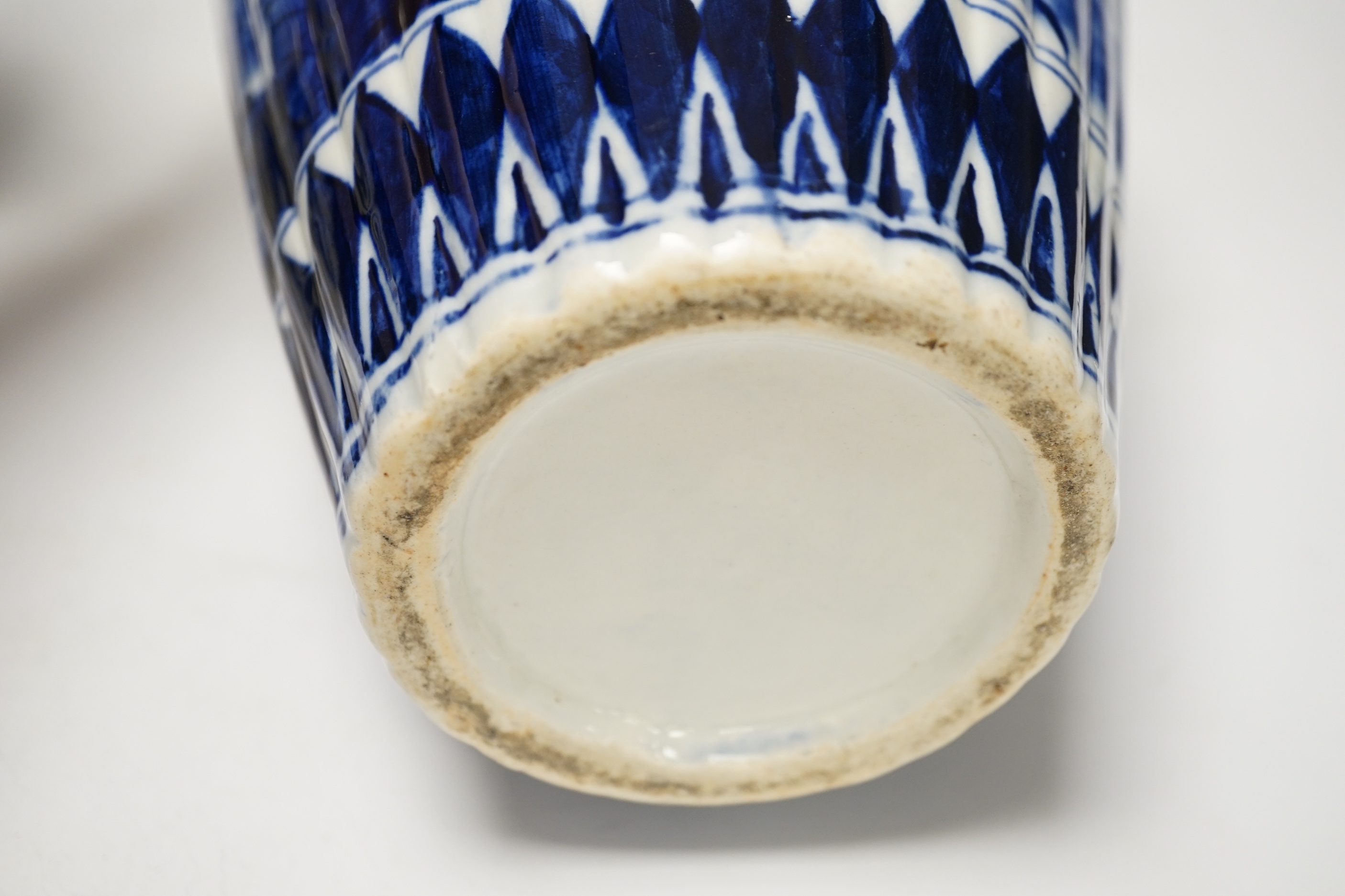 Three 19th century Chinese blue and white vases including a floral pair and a Japanese vase, largest 39cm high